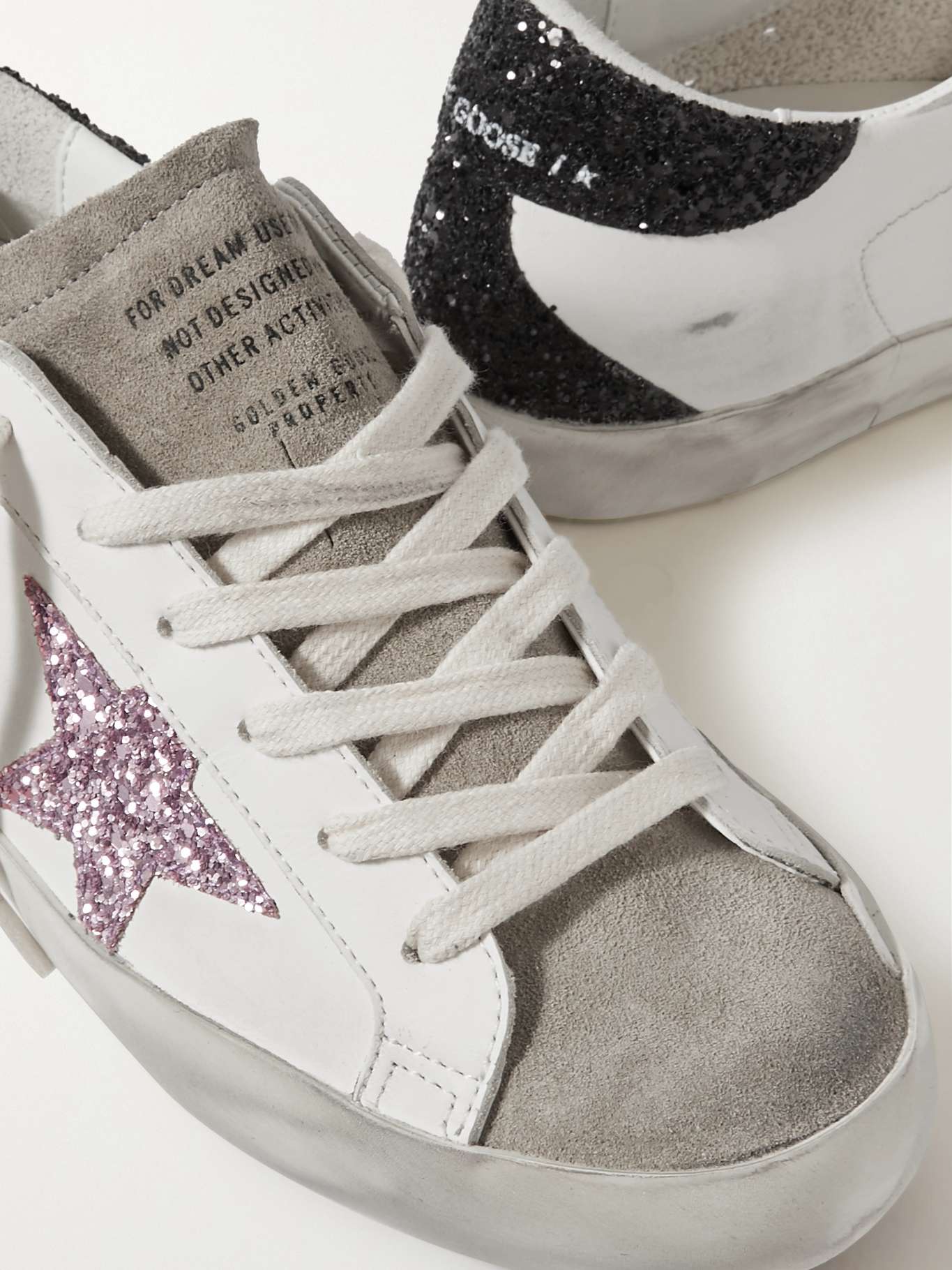 GOLDEN GOOSE
Superstar distressed glittered leather sneakers