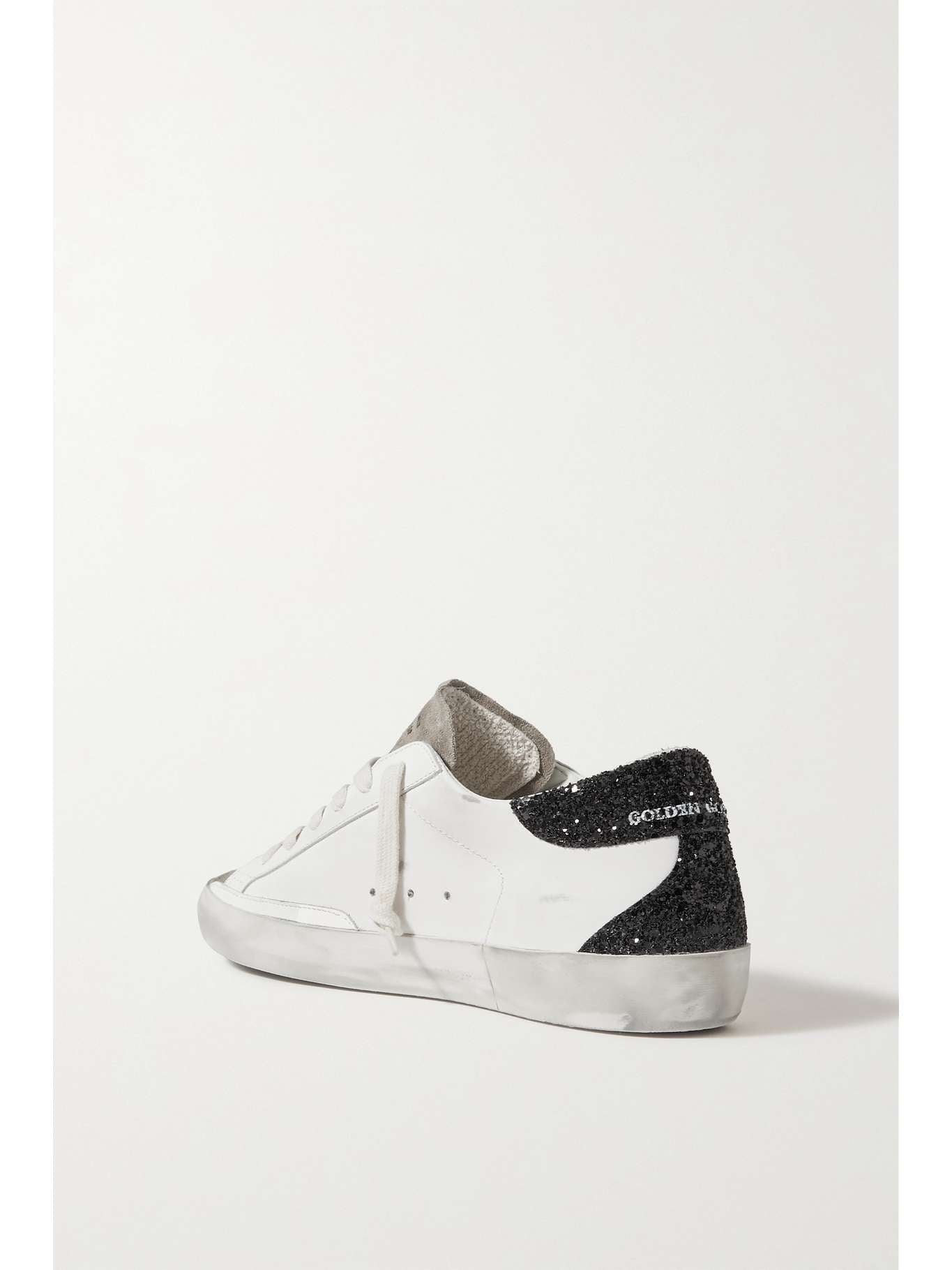 GOLDEN GOOSE
Superstar distressed glittered leather sneakers