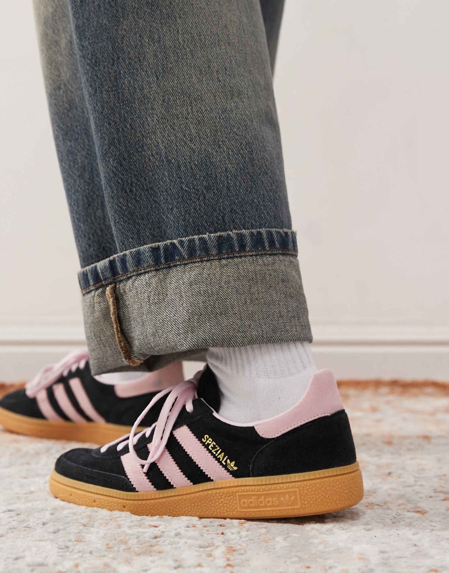 adidas Originals Handball Spezial sneakers in black and pink